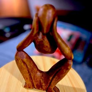 “and I wonder..” wooden sculpture